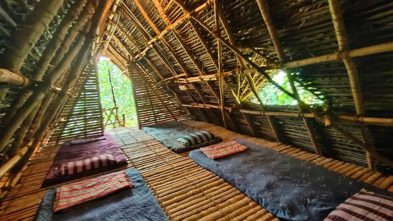 dormitory space inside a hut at Chords of Nature Abodes